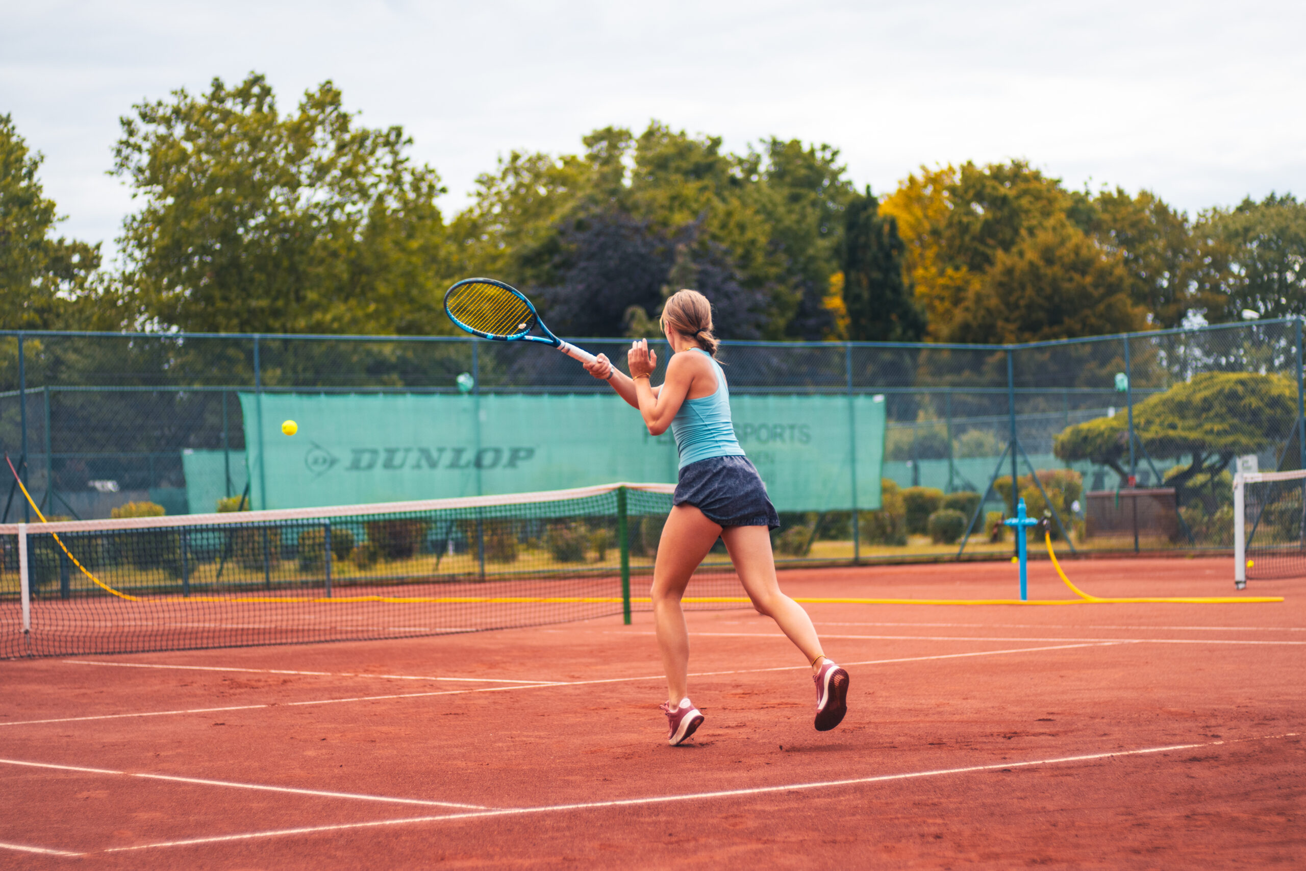 female tennis player at court