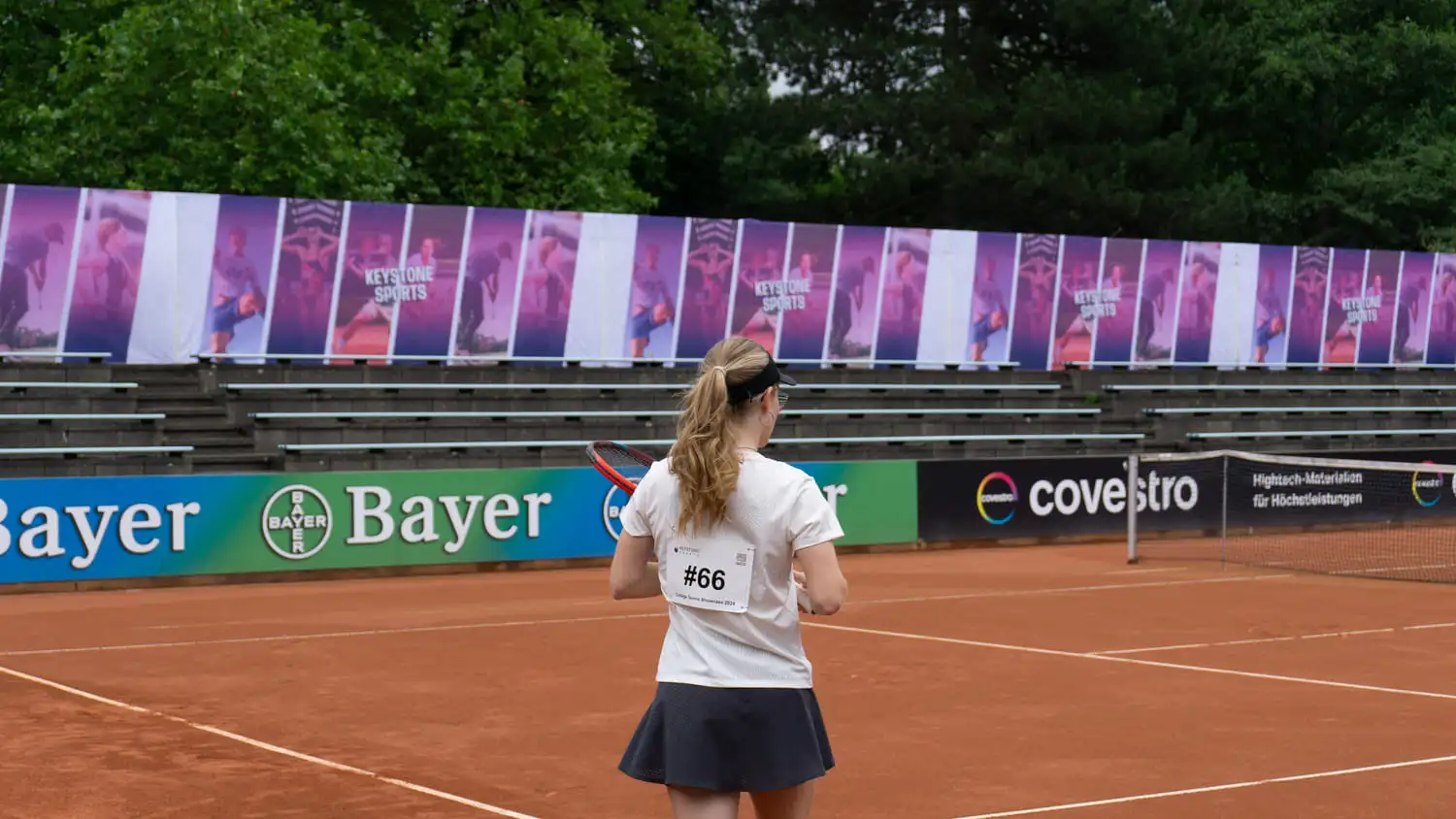 female player at tennis showcase