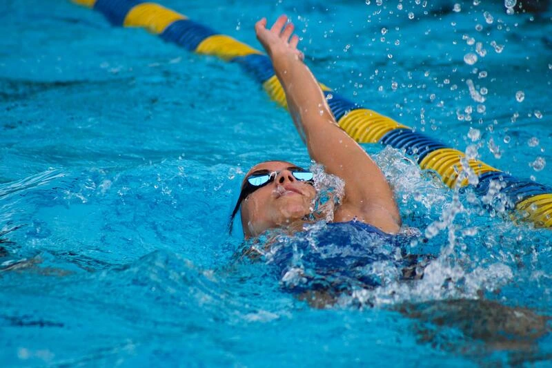 female college swimmer in the water